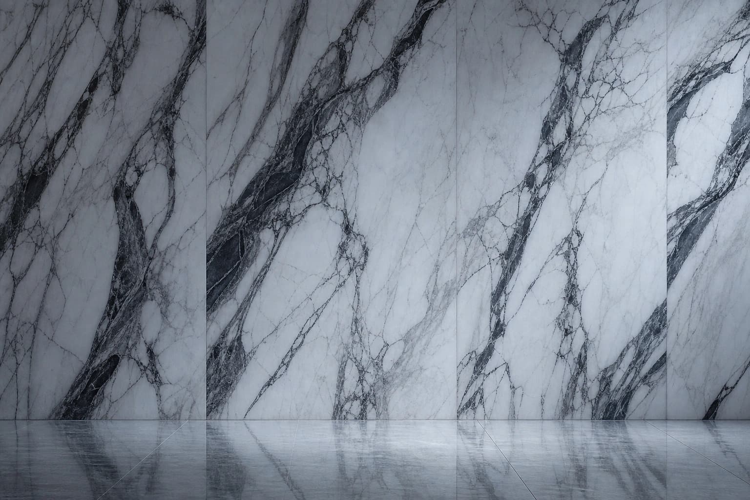 Veined natural marble slab wall in close detail under cool studio light.